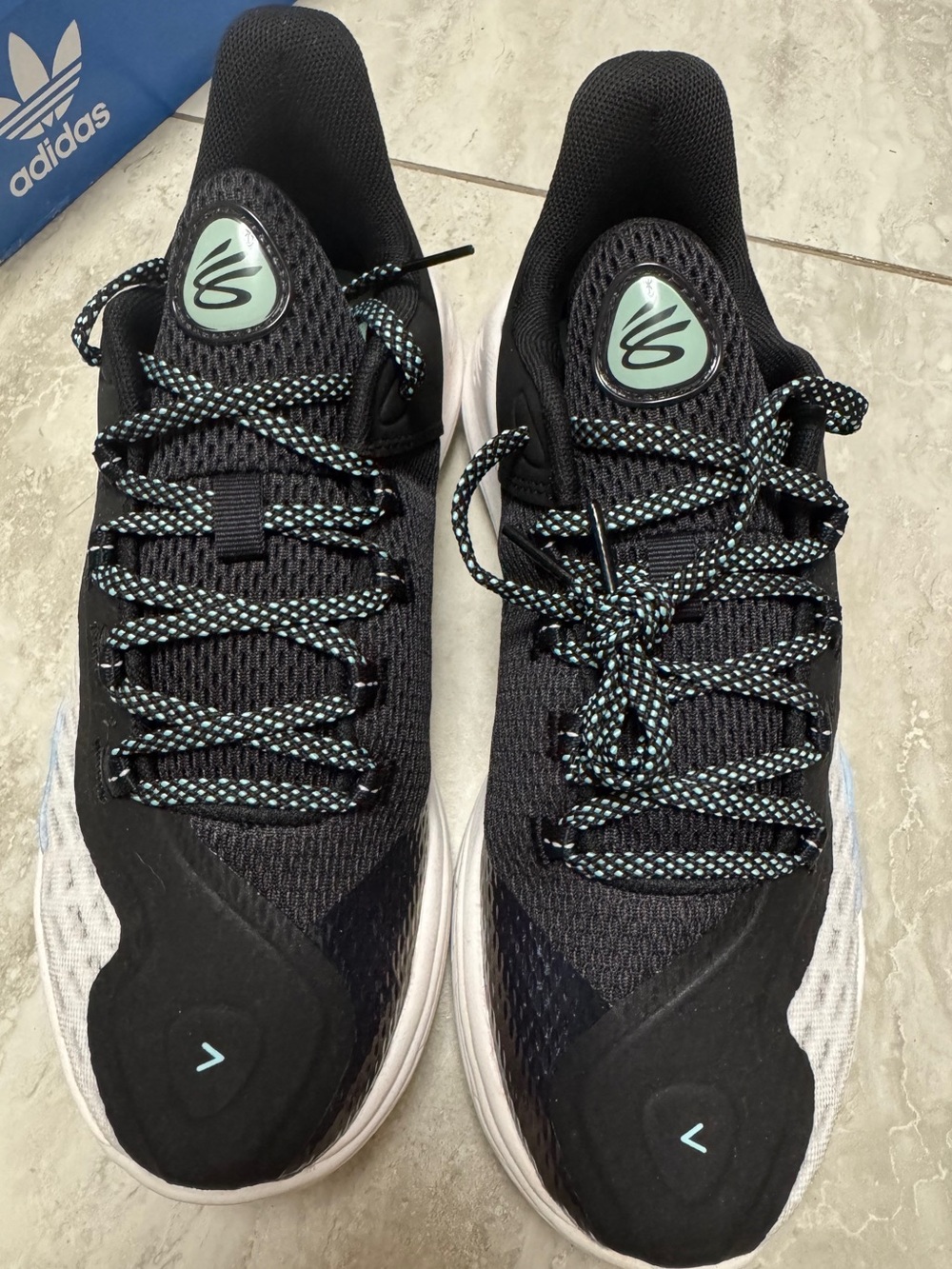 Steph Curry Under armor Black Knit Sneakers with Mint/teal Accents